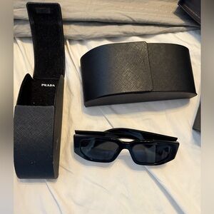 Prada black 09ZS Sunglasses never worn comes with original packaging